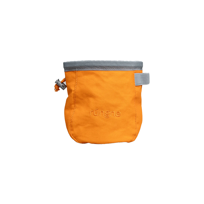 Rúngne Craft Chalk Bag is a premium climbing accessory designed for climbers who prioritize functionality and durability. Crafted from soft canvas cotton, it features an extra-wide opening for quick and easy chalk access during climbs. The interior is lined with fleece to minimize chalk dust seepage and is easy to clean. Additionally, the bag includes a chalk brush loop and comes with a lightweight yet sturdy nylon belt for secure attachment.